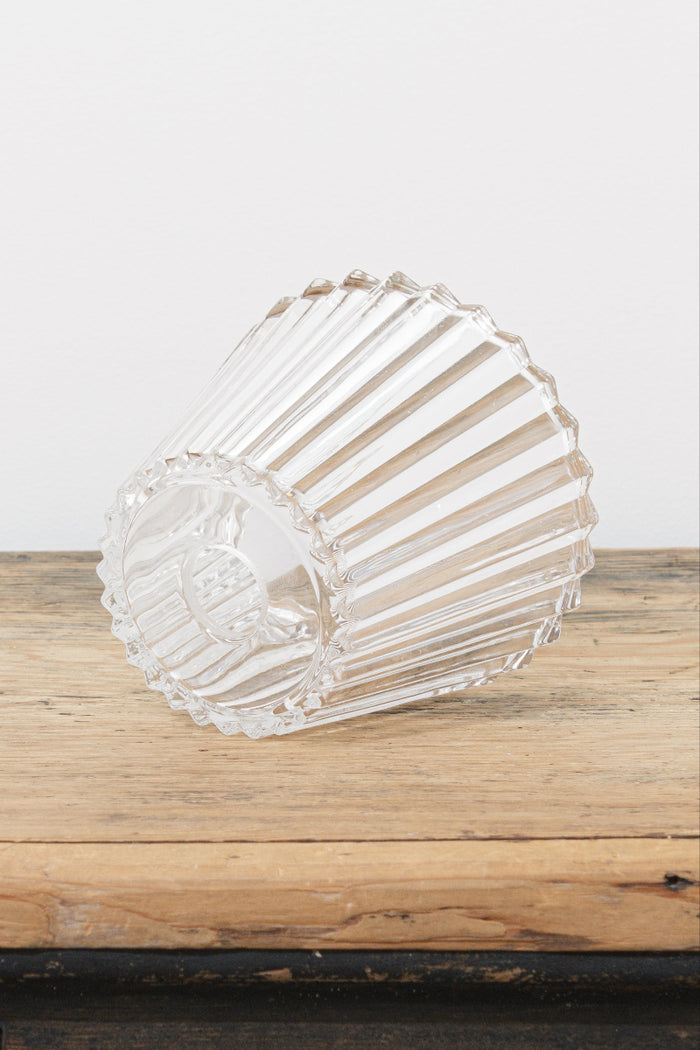 Detailed angled close-up of the clear ribbed glass shade.