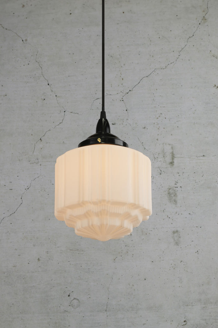 Opal glass shade with art deco features and hand blown glass