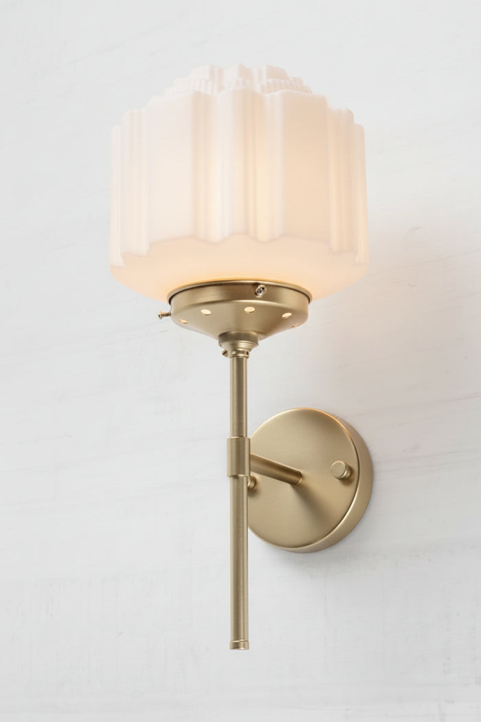 Gold/Brass steel stem wall sconce and an opal glass deco shade