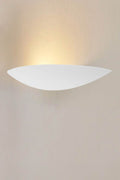 Shallow half dish shaped plaster wall light.