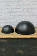 Black dome shades in small and large.