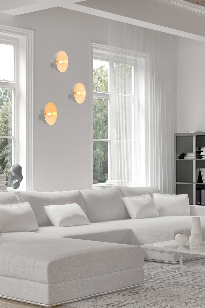 Dome wall lights in a white finish on wall