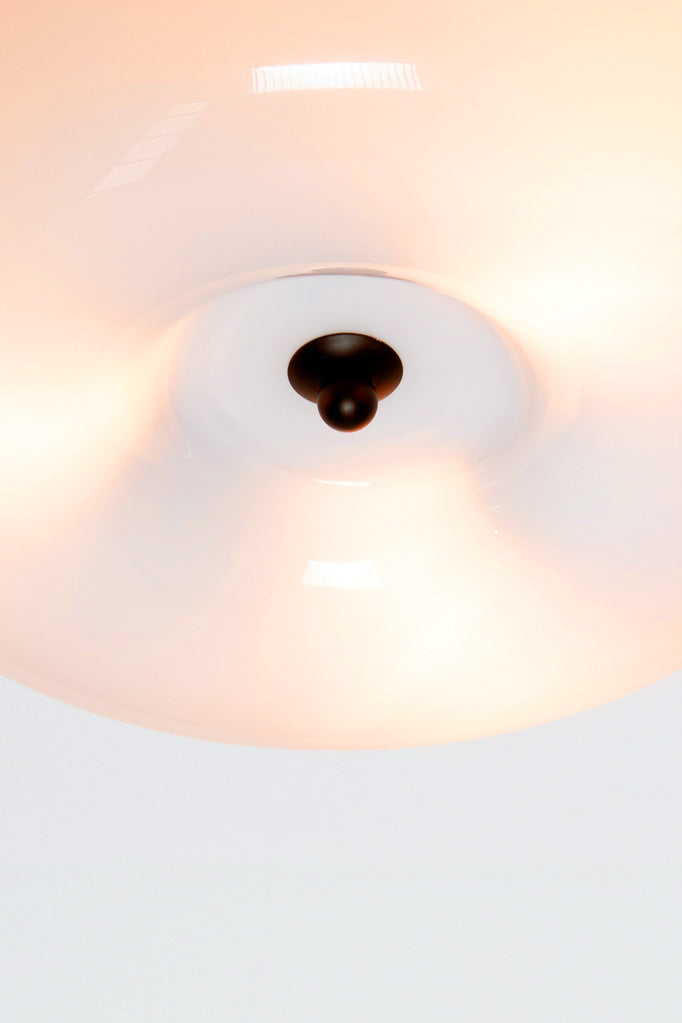 Metalware centerpeice in a black finish.