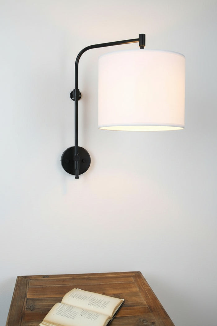 Wing arm wall light with white fabric shade