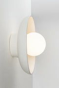 ceramic shade wall sconce with an opal glass ball shade.