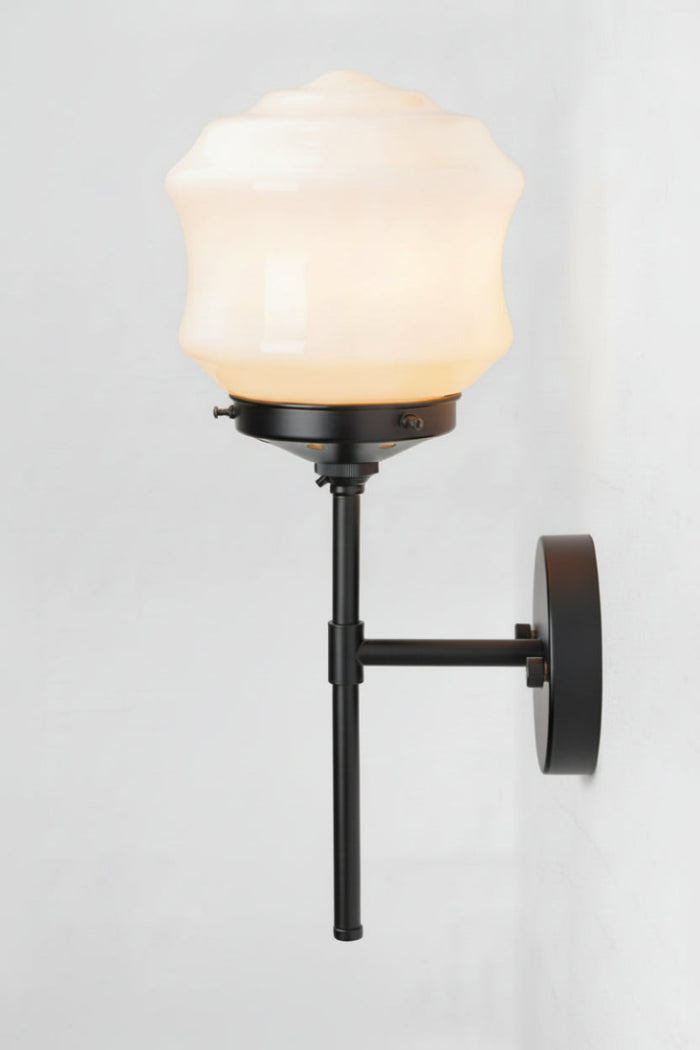 Black stem wall light with the flinders opal glass shade from the side.