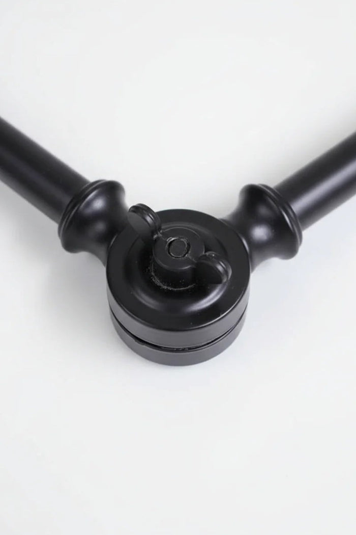 Swing arm wall light knuckle for fixing arm into place
