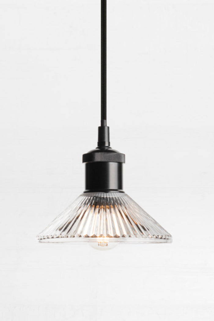 Florence reeded glass shade on black lampholder.