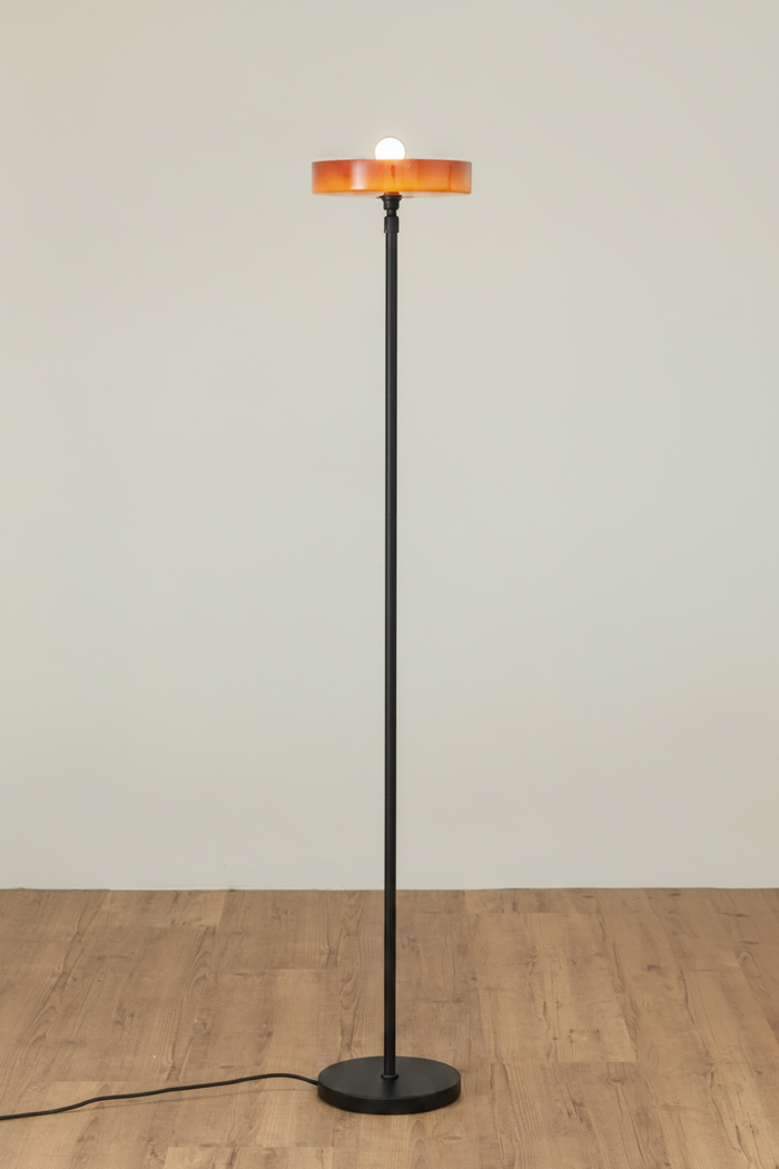Gambier amber glass shade on black floor base