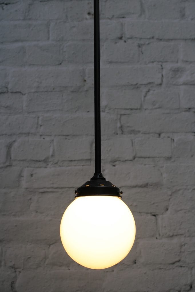 Junction light with C configuration and opal glass ball shade
