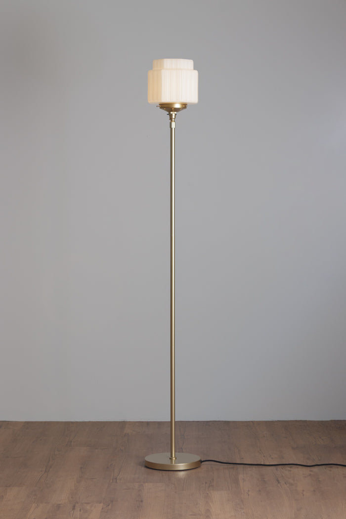 Gold/Brass stem floor lamp with an opal art deco inspired glass shade.