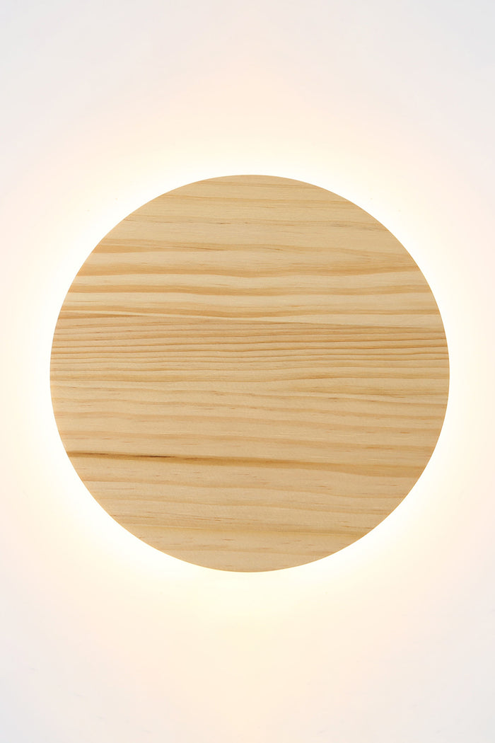 Large natural wood back-lit LED wall light.