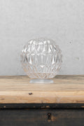 Characterised by a diamond cut points textured pattern on its glass.