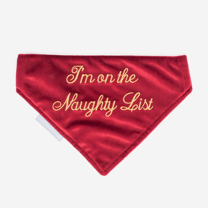 Discover The Perfect Bandana For Dogs, ' I'm on the Naughty List ' Dog Bandana In Luxury Cranberry Velvet, Available To Now at Lords & Labradors