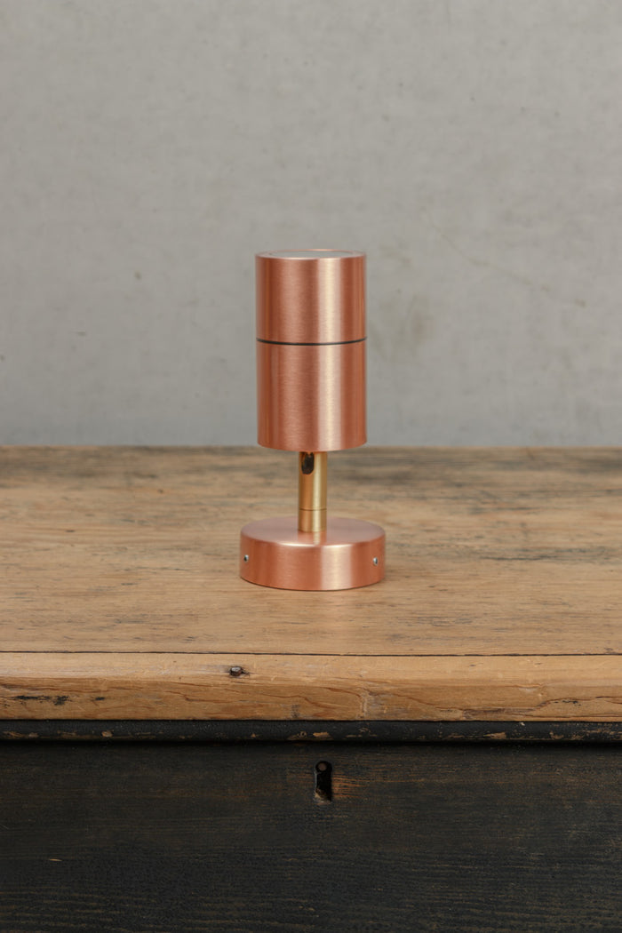 Uninstalled fully extendedn outdoor polished brass spotllight.
