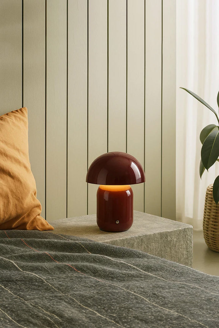 Red illuminated LED mushroom lamp as a bedside light.