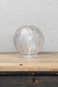 Vintage inpired orb-shaped glass with detailed patterns