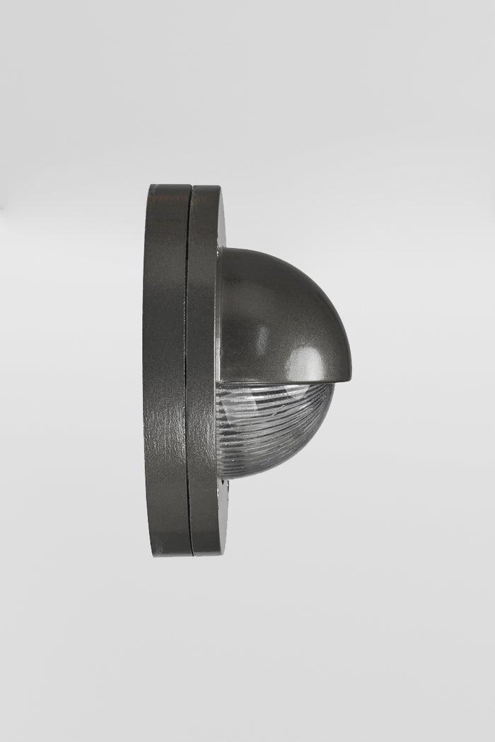Side view of the Charcoal coloured eyelid step light, with LED light source.