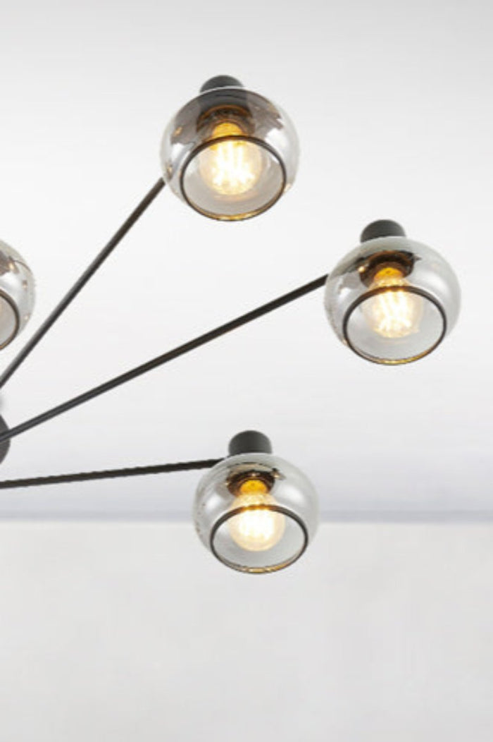 Under view of the 8 light ceiling light in black with glass shades