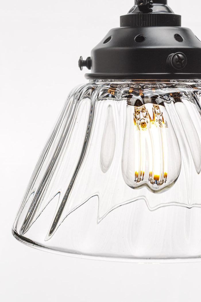Intricately patterned glass shade brings a touch of texture and nostalgia to a room