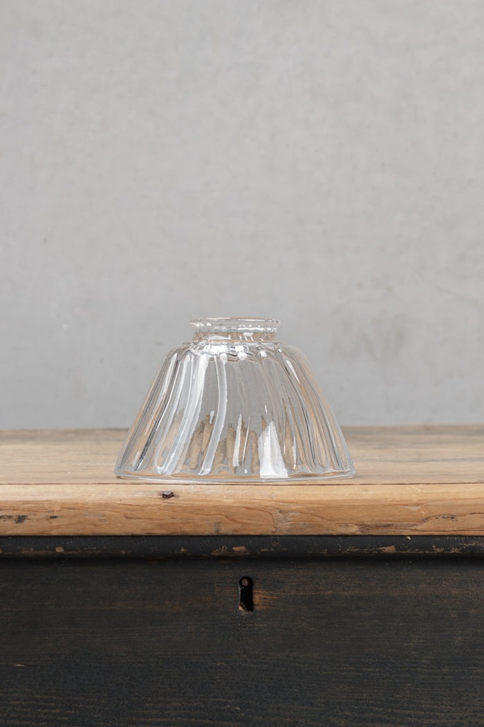 Intricately patterned glass shade brings a touch of texture and nostalgia
