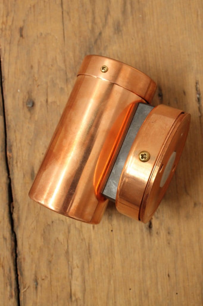 Bright copper spotlights. frotn door lighting. decking and patio lights