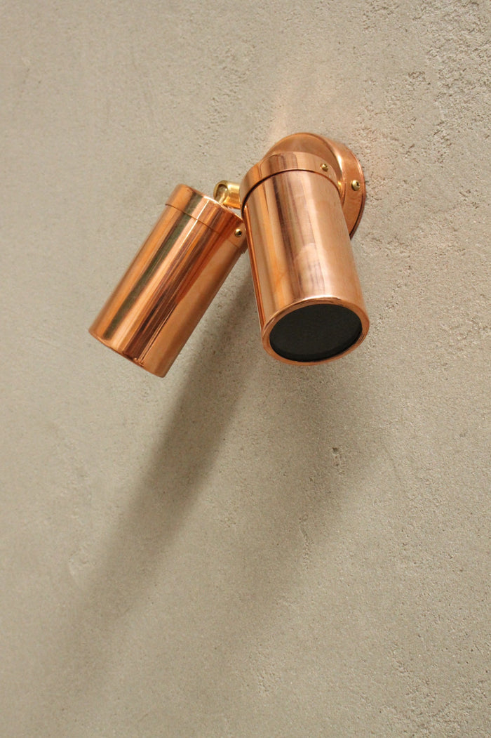 Polished copper outdoor lighting for home. walkway lighting.