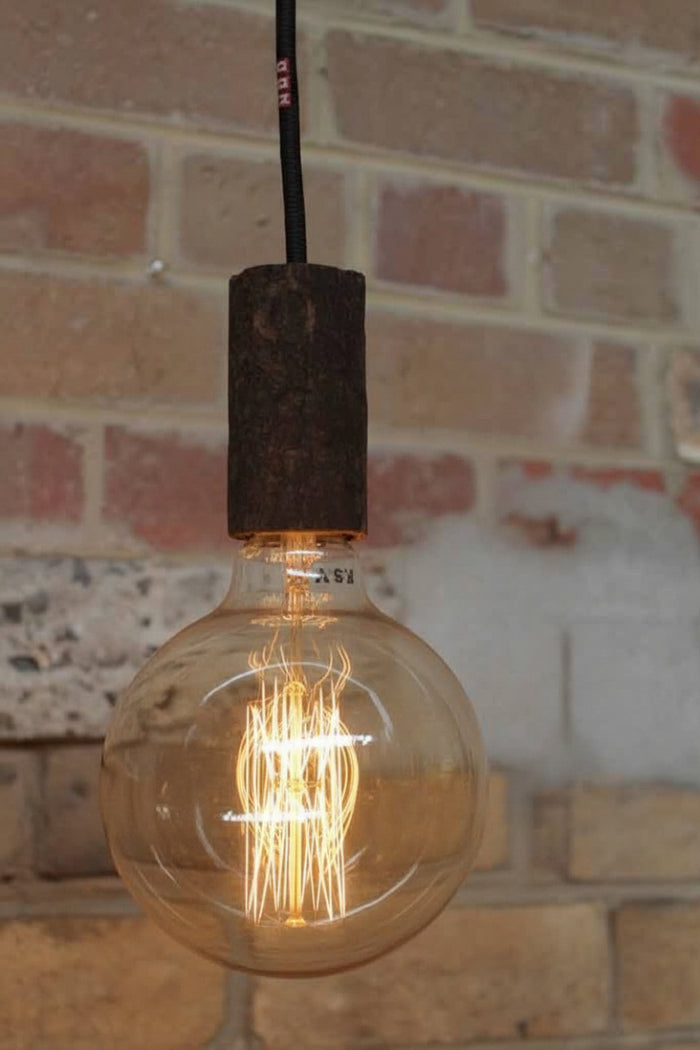 Nud lamp holder in upcycled cork in soil