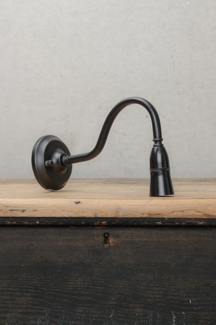 Small black, steel, gooseneck outdoor wall sconce.