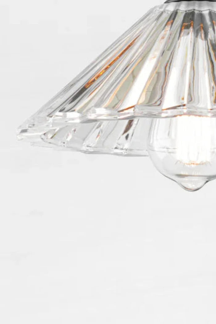 Close up of the Paris Pleated Glass shade, with a teardrop bulb.