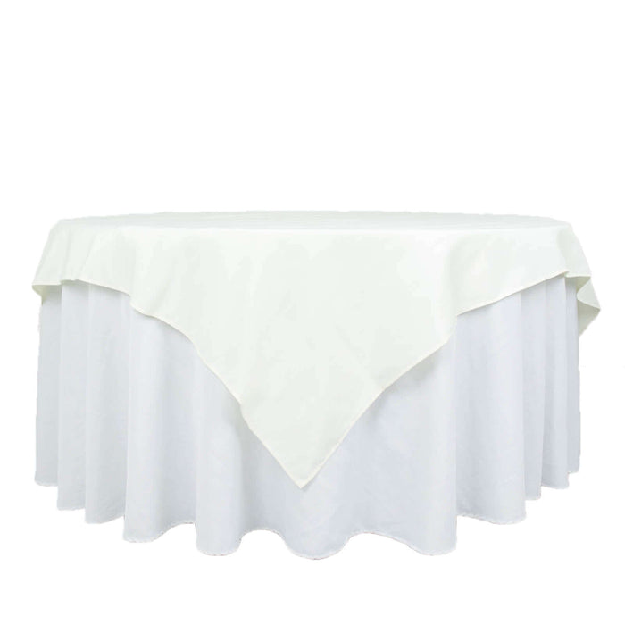White round tablecloth draped elegantly over a table.