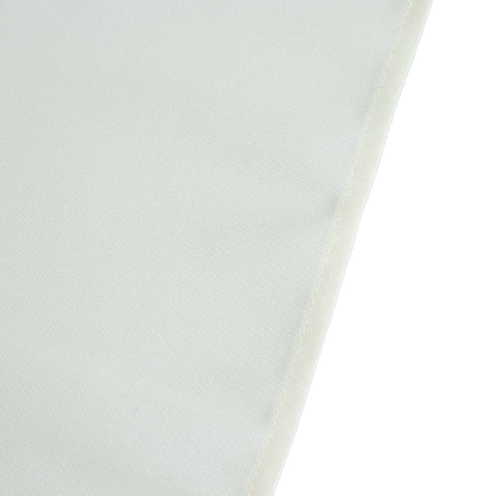 Close-up view of a textured fabric in soft white color.