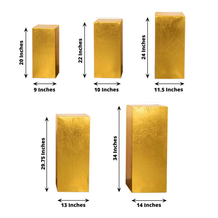 Gold decorative box set with various heights and dimensions displayed on a white background