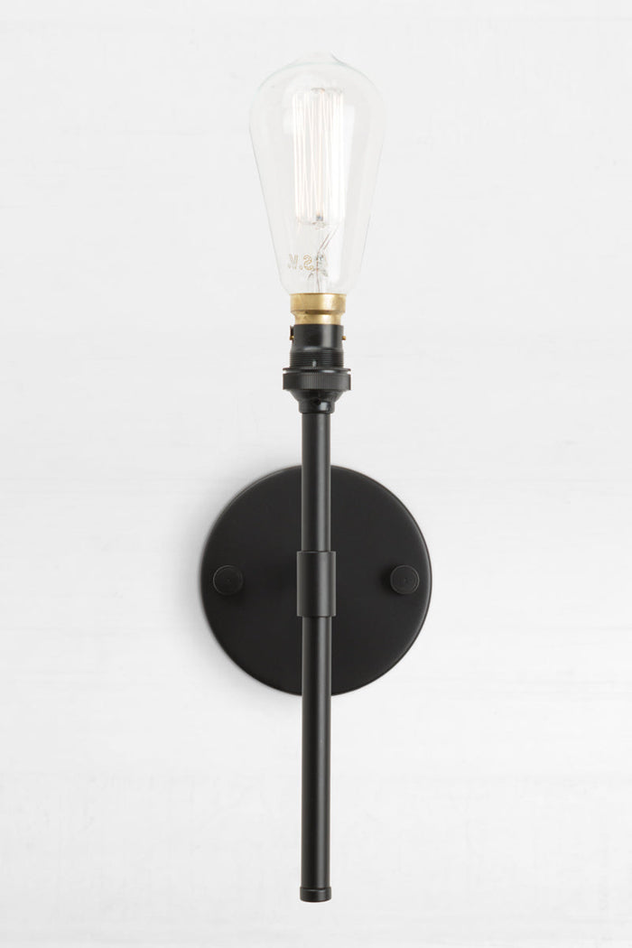 Stem wall light in black ideal for narrow wall placements