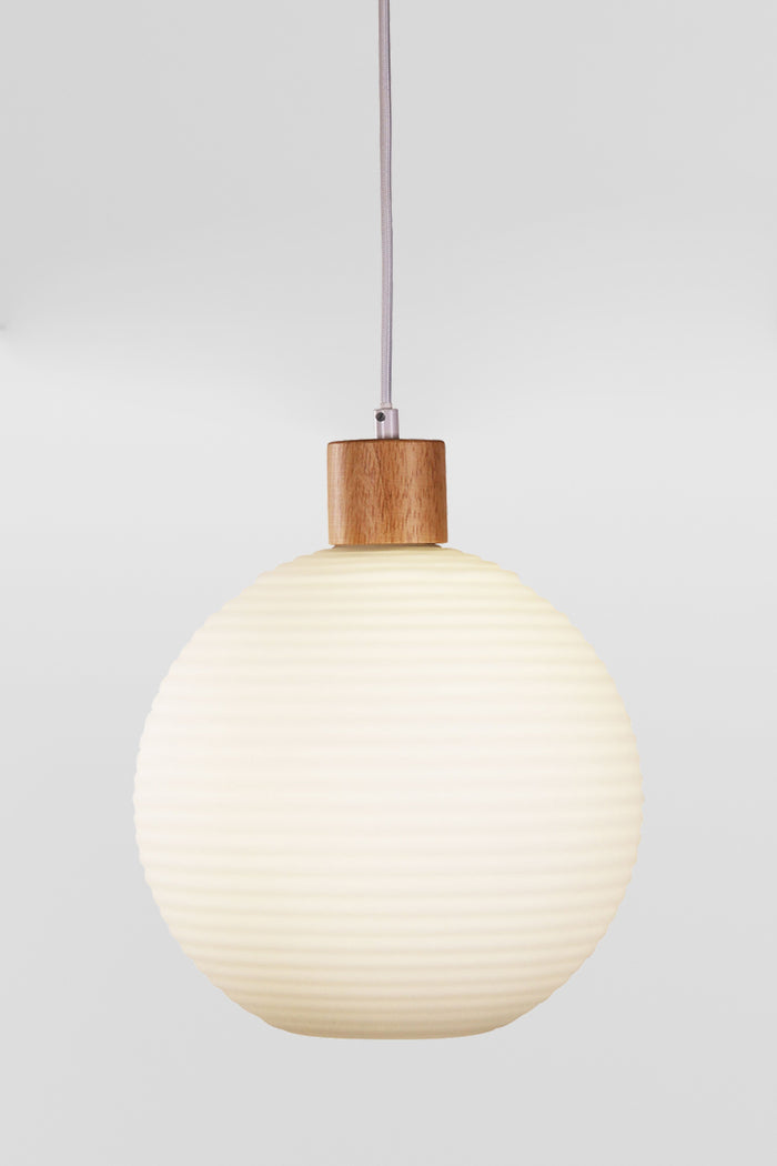 Medium round opal glass shade with ripple effect and timber detailing.