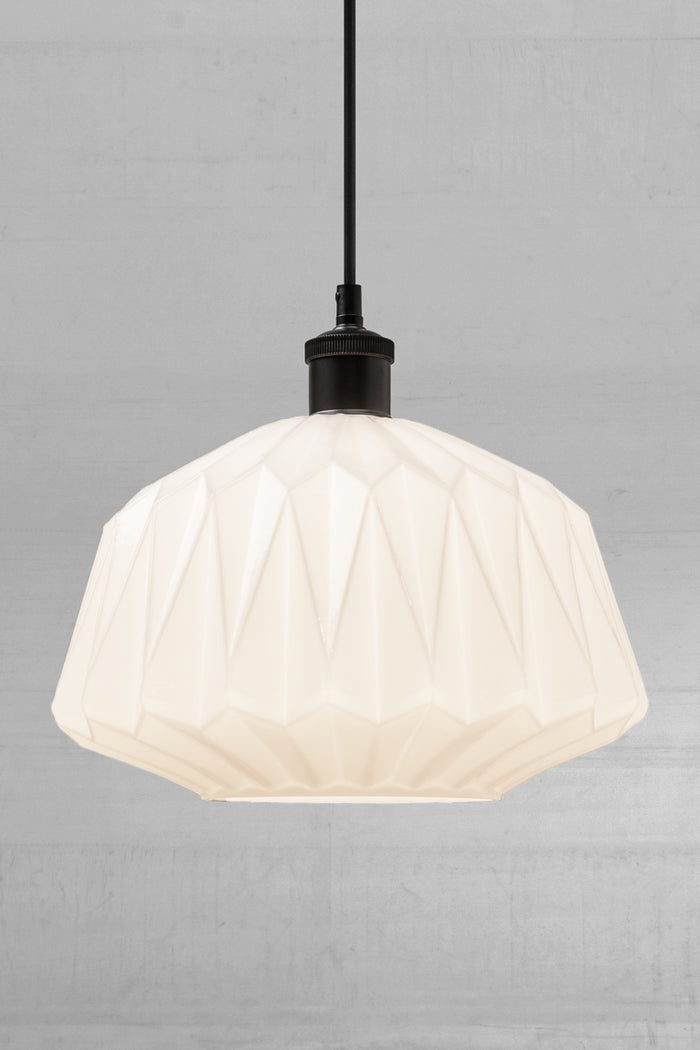 Opal geometric shade with a black lampholder and cord.
