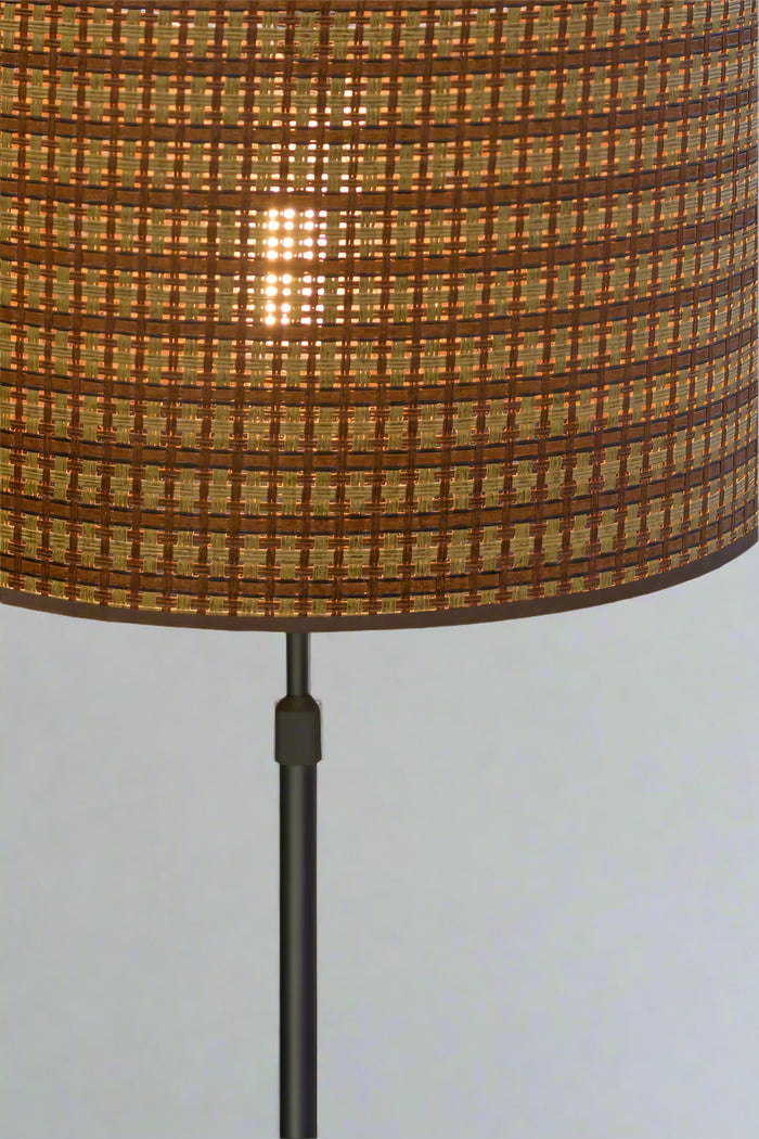 Close up of the floor lamp with black stand.