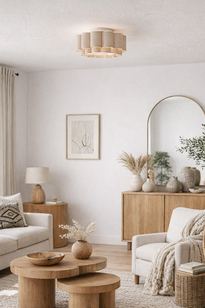 Beige, scalloped shade as a ceiling light in a fresh japandi looking living room.