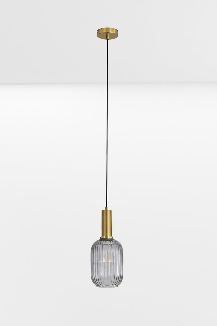 Smoke reeded glass shade with antique brass metalware.