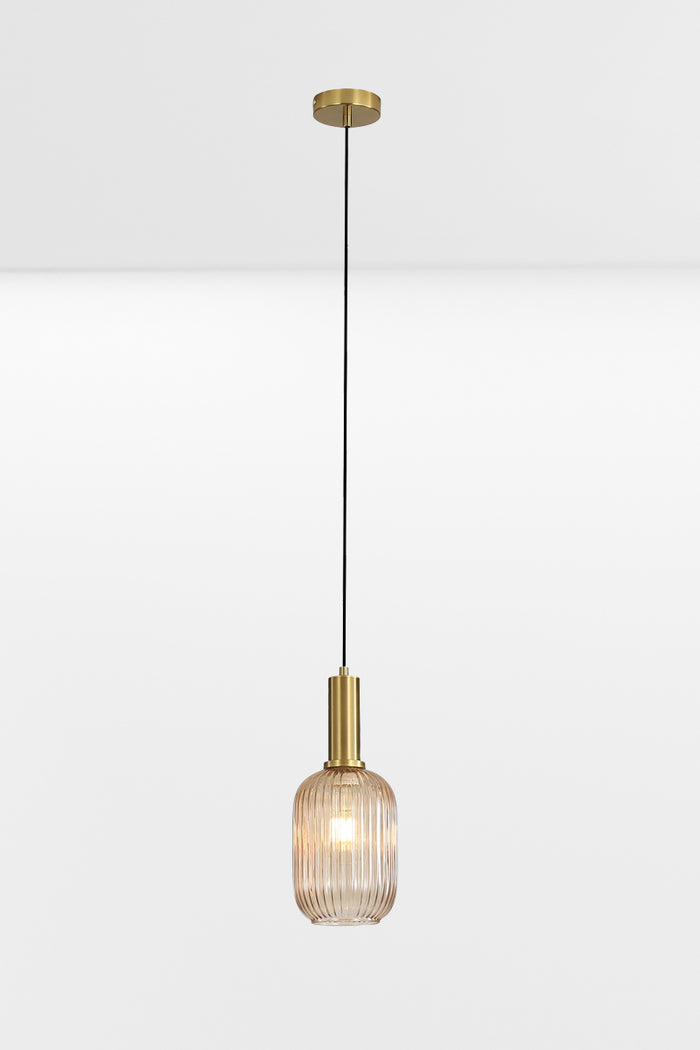 Amber reeded glass shade with antique brass metalware.