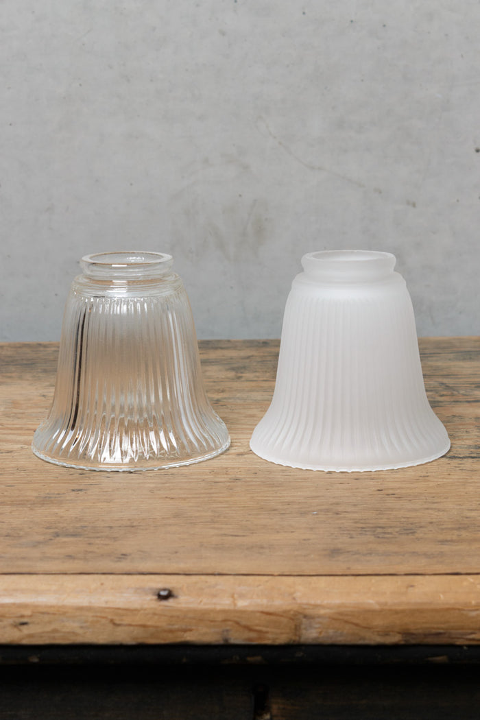 Two finishes of the small ribbed glass shades.